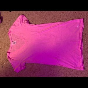 A pink v neck pink shirt size s